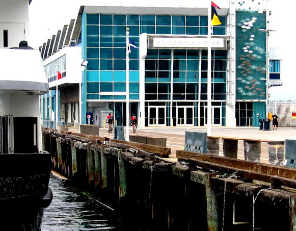 Pier pilings, harbor cruise boat and the beautiful pavilion.