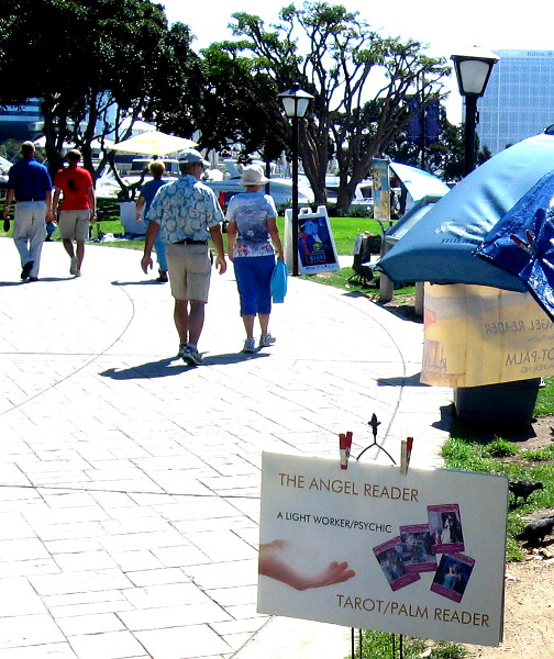 The Angel Reader does both tarot and palm reading.