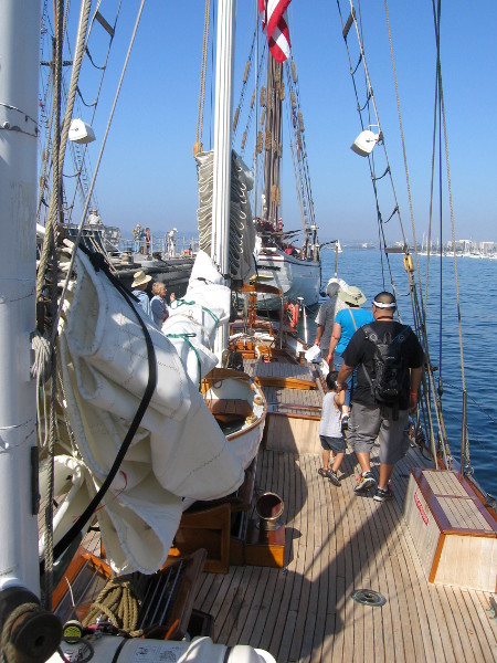 Visitors check out the small schooner Curlew.