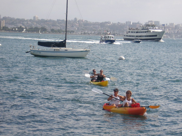 A beautiful day on Shelter Island and kayakers approach the boat ramp area.