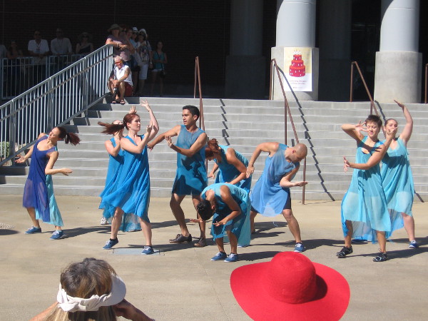 Rhythmic energy fills the unusual stage on a sunny, quite warm day.
