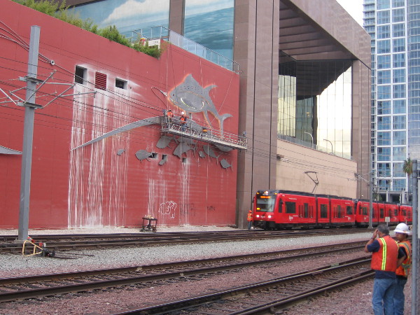 New public art being applied to building on San Diego's waterfront.