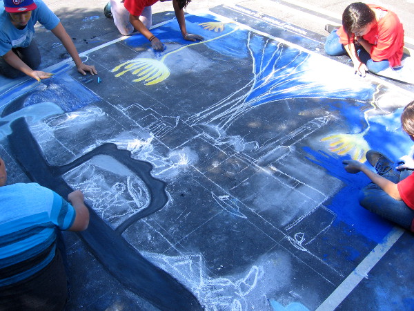 Roosevelt I.B. Middle School students work on a scene that includes a gondola.