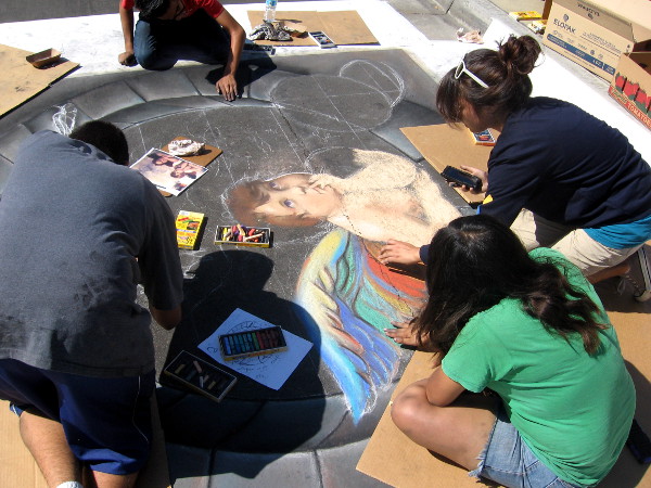 Very talented young people are hard at work on a sunny day in San Diego.