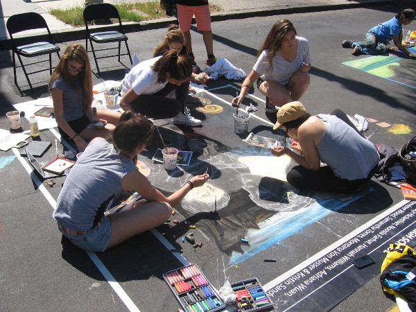 Team from Cathedral Catholic High School works to create some elaborate art.