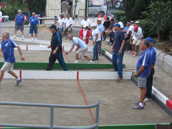 Participants in Little Italy's Festa Bocce Ball Tournament at practice.