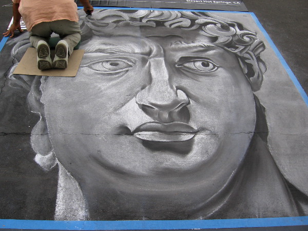 Bijan Masoumpanah chalk art shows face of classic Roman statue.