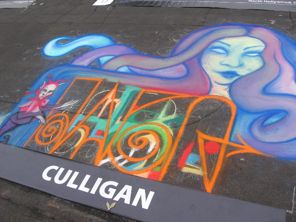 Aaron Hernandez uses bright colors in this distinctive chalk art.