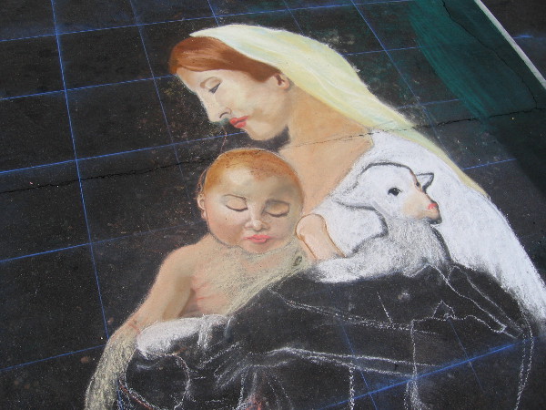 Kira Lewis-Martinez chalk art of a classic Nativity scene.