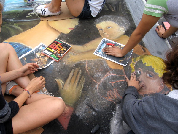 Cathedral Catholic High School team still working hard on the chalk masterpiece.