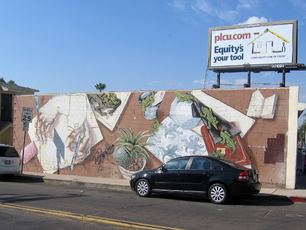 Colorful images on a building at 56th and El Cajon Boulevard in San Diego.