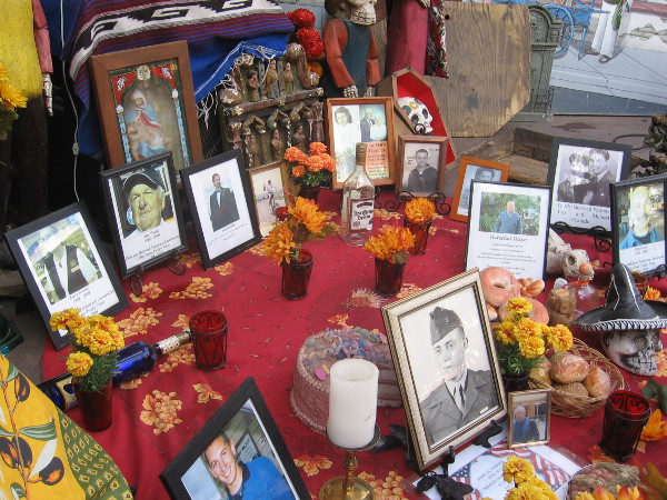 Photographs remember loved ones who have passed into the spirit world after death.