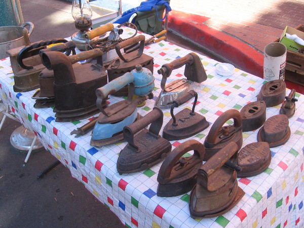 A table full of rusty irons from the Old West!