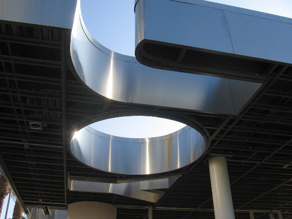 Word shining from roof of pavilion spells JOY.