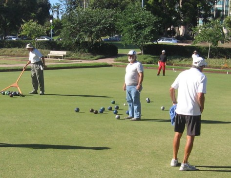 A game has ended and the scattered balls are collected.
