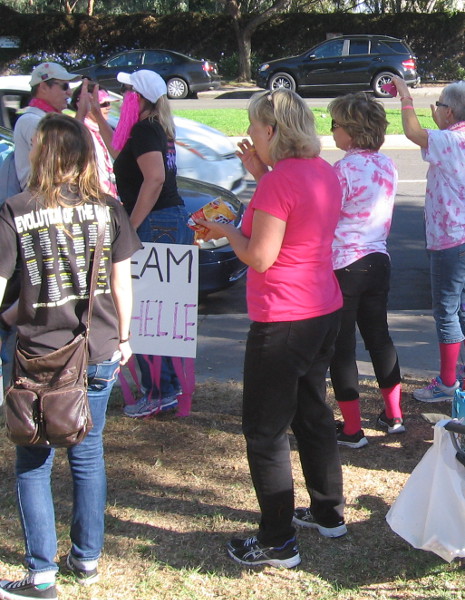 San Diego walkers cheered by pink-wearing supporters on Park Boulevard.