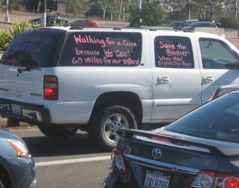 Cars coming down the street honked and featured optimistic messages.