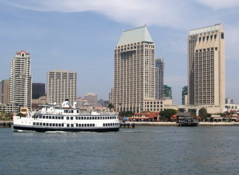Lord Hornblower passes Hyatt hotel buildings on San Diego Bay.