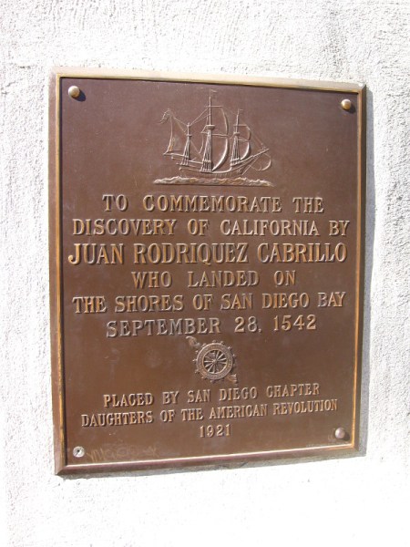 Plaque by Museum of Man commemorates Cabrillo's discovery of California.