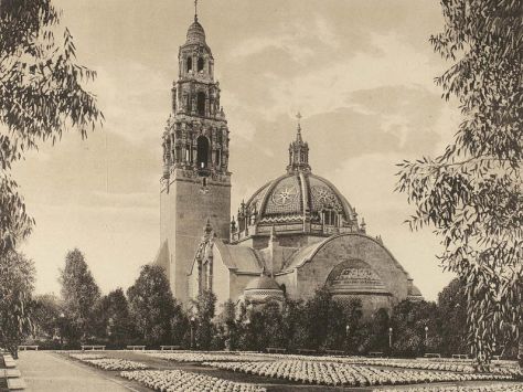 Spacious gardens near California State Building's landmark dome and bell tower during the Panama-California Exposition.