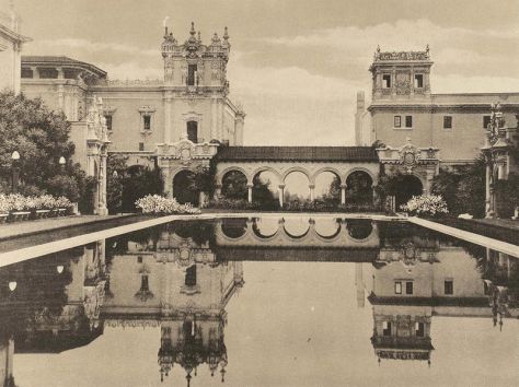 Gazing over reflecting pool at Commerce and Industries Building and Foreign Arts Building. A favorite photographic spot for a century in San Diego.