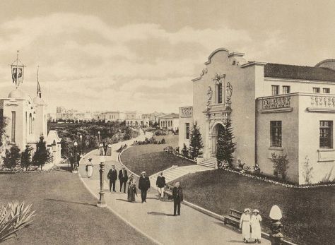 People take a stroll past a handful of state buildings at the Panama-California Exposition in Balboa Park.