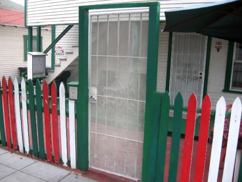Colors of the Italian flag frame this unusual door on India Street.