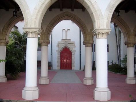St. Paul's Cathedral in Bankers Hill and an elegant red door behind rows of columns.