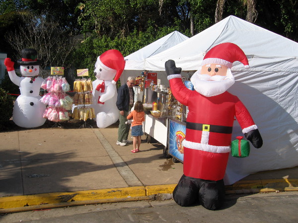Santa, Frosty and joyful San Diegans at December Nights in Balboa Park.