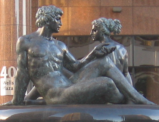 The reclining human figures today have a very dark bronze appearance!