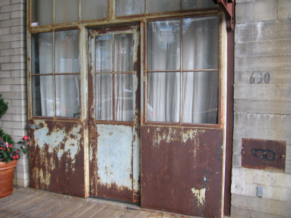 This rusted door makes a fashionable statement in downtown San Diego.