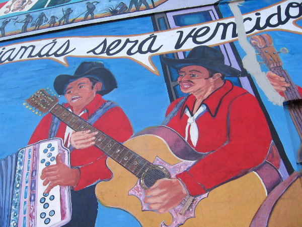 Musicians play instruments adding flavor to the celebration.