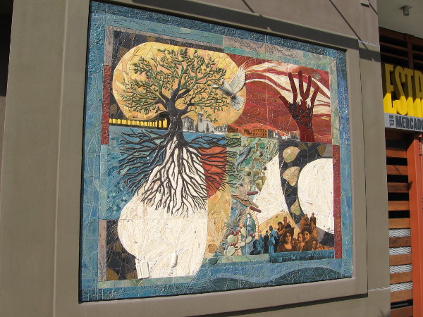 Beautiful artwork near door of Estrella del Mercado Apartments.