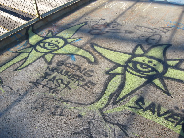 Two strange eyes seem to sprout from the concrete. Going nowhere fast.