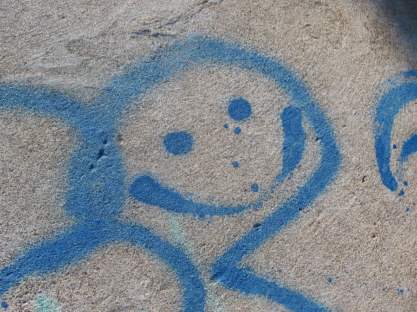 Another simple, childish smile. Even where it's bleak, there is always hope.