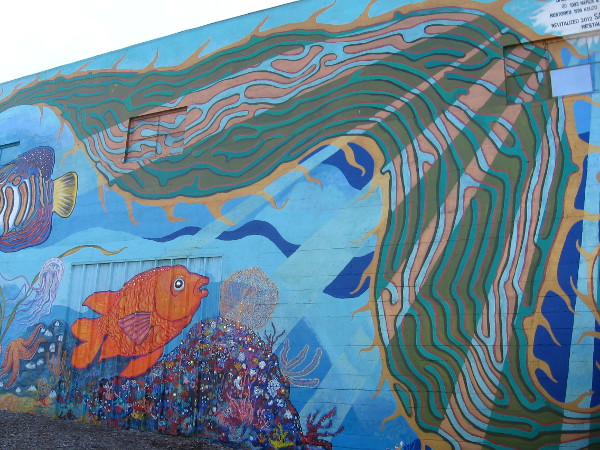 Kelp frames the end of this long, amazing mural in Barrio Logan.