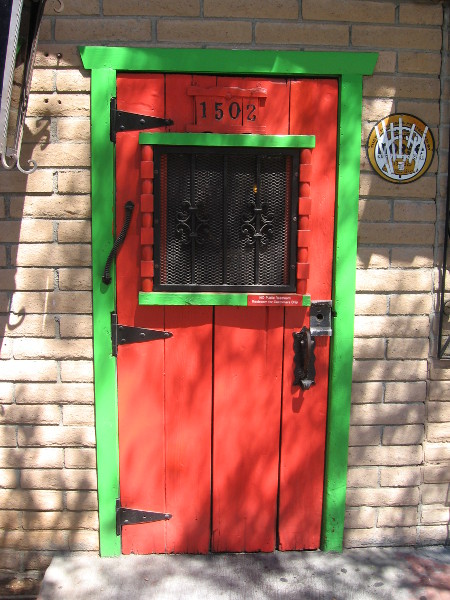 Just a cheerful orange and bright green door in East Village!