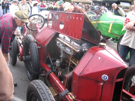 And here's a guy checking out the engine of an Italian Isotta Fraschini.