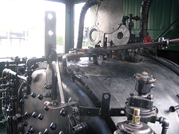 Part of the complex machinery and controls in the steam locomotive's cab.