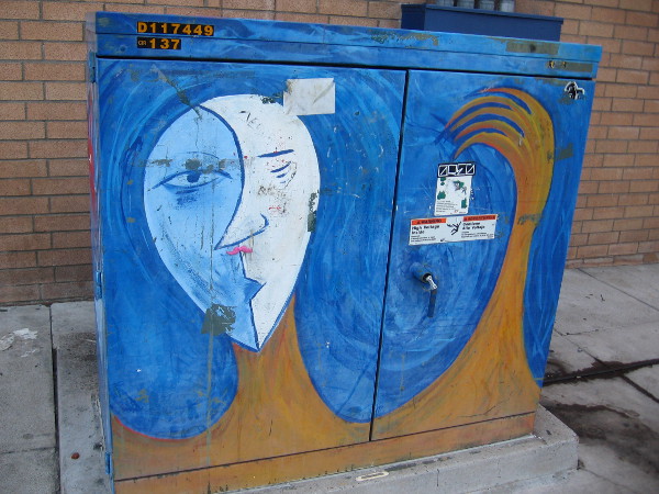 Cool abstract face on an imaginative Hillcrest utility box.