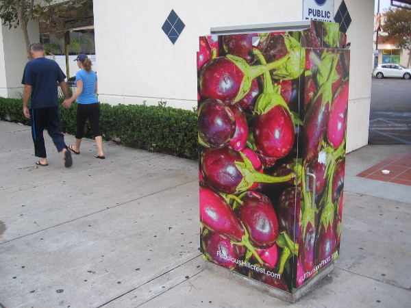 Some large utility boxes in Hillcrest feature various fruit and vegetables.