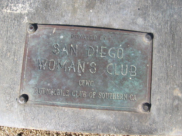 Plaque on Harbor Drive reveals nearby bell was donated by San Diego Woman's Club.