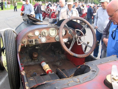 Wooden dashboard full of knobs looks almost prehistoric compared to modern cars!