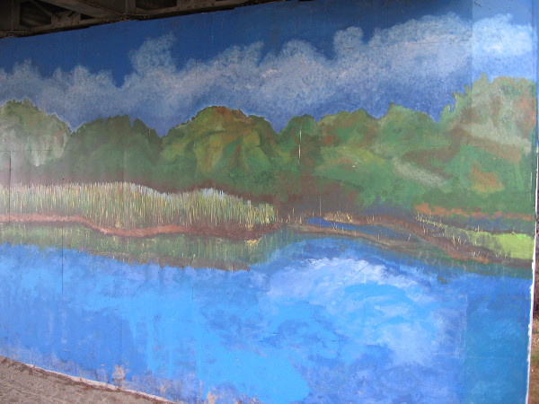 Second mural painted on south side of Friars Road also shows a river scene.