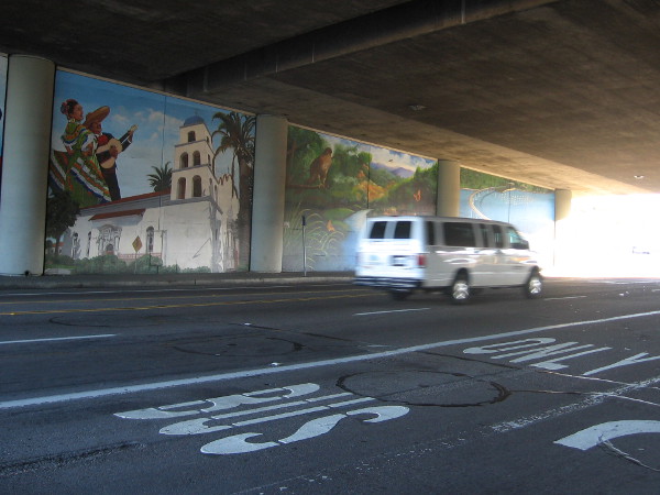 Four large works of art can be glimpsed by motorists as they drive under the busy overpass.