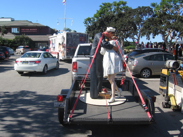Small model of Seward Johnson's Unconditional Surrender sculpture is on display.