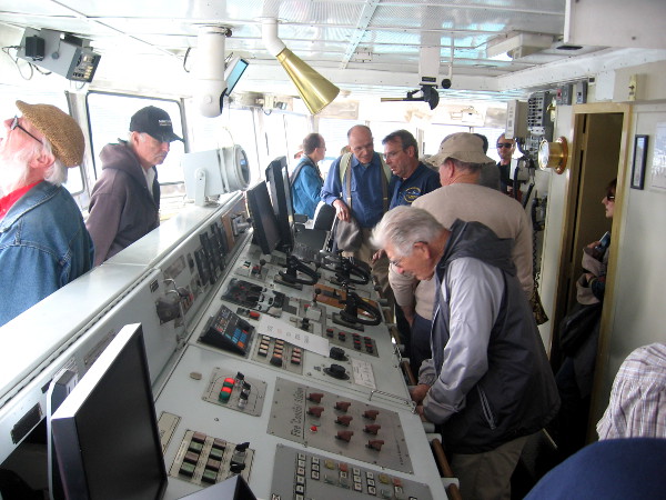 Huge number of buttons, knobs, switches and dials in the pilot house of Melville.