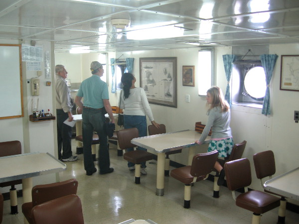 Visitors check out the mess hall where crew and research scientists enjoyed a break, to eat, talk and share knowledge.