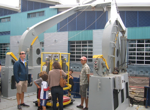 Ocean probe with multiple sensors near an A-frame at ship's side, where it might be lowered by cable into the water.