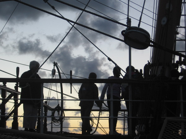 Students hauling a rope learn about sailing and seamanship on Star of India.
